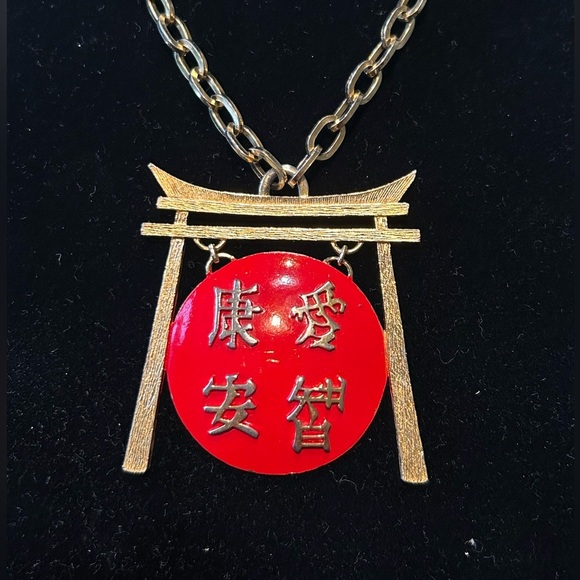 Vintage Crown Trifari Love Is… Red enamel and Gold Pendant Necklace.​